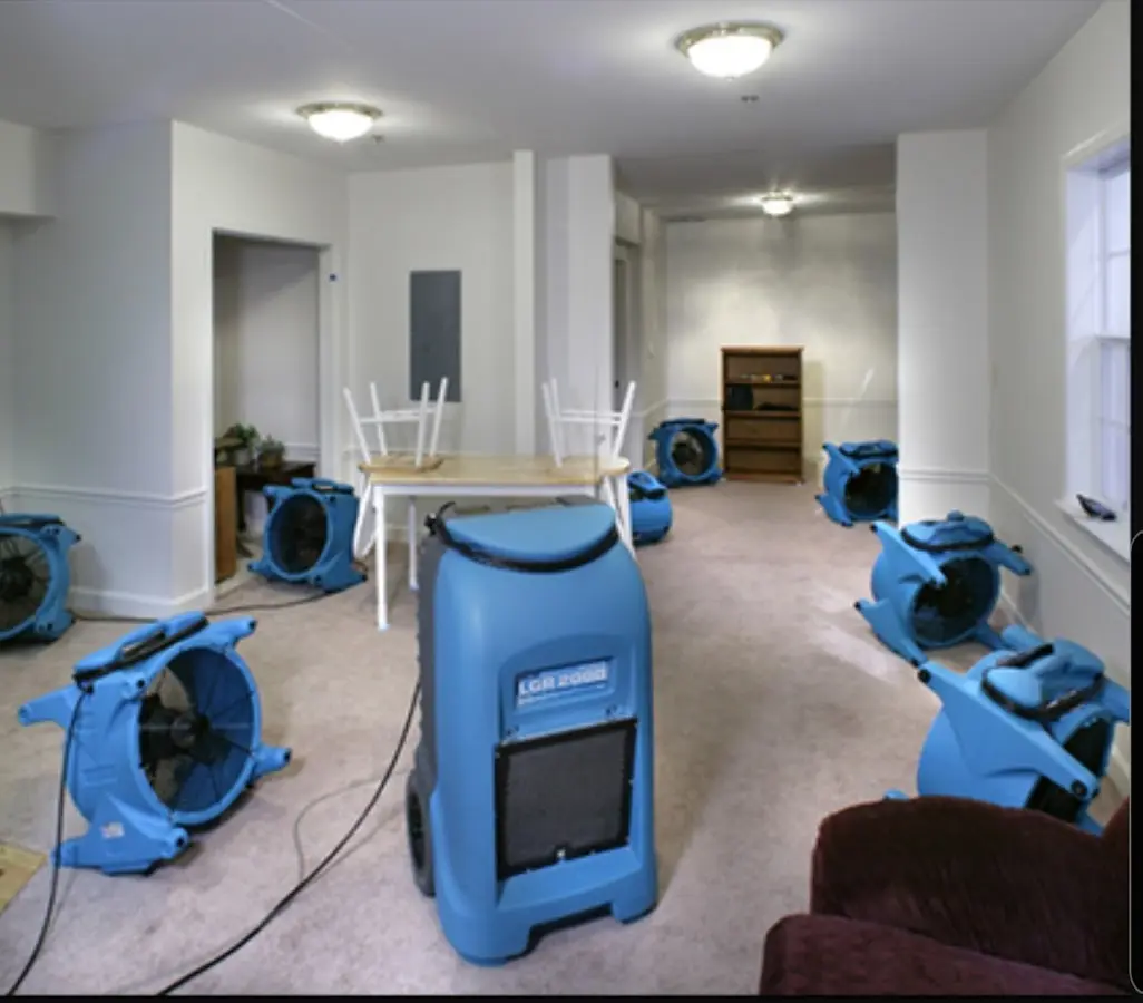 Air movers and dehumidifier setup for Water Damage Restoration in Kingsburg